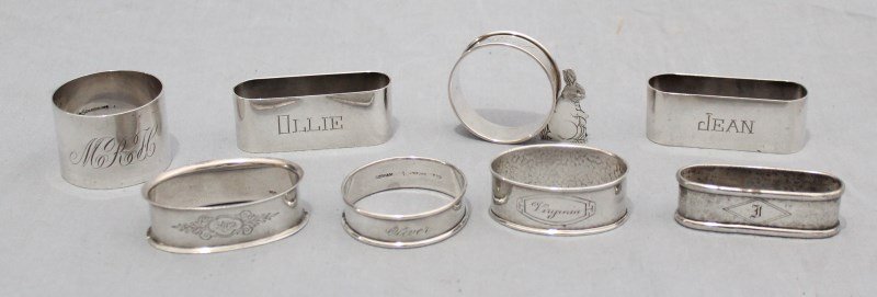 8 PC VICTORIAN STERLING SILVER NAPKIN RINGS: Lot of 8 very collectible assorted Victorian Sterling Silver Napkin Rings. A pair of matching sterling inscribed Ollie and Jean, a Webster sterling Cheryl with rabbit, Webster hammered sterling Virgin