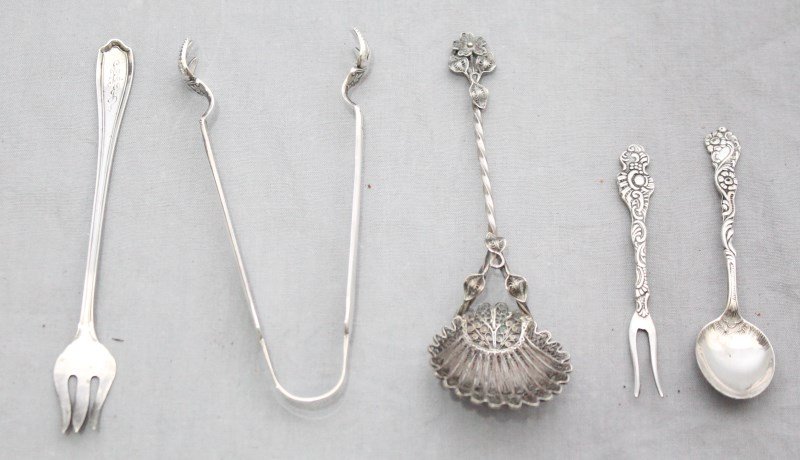 LOT OF SILVER SUGAR SHELL, BON BON, LEMON FORKS: A beautiful ornate Filigree Silver Bon Bon Spoon - Continental silver. AB Nils-Johan Lemon Fork and Sugar Spoon, Silverplate Extra PRNS ALP Sweden Flowers both Vintage 1950s, Reed & Barton Silverplate