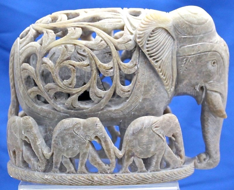 VINTAGE CARVED SOAPSTONE ELEPHANT WITH BABY & FAMILY: Delightful Vintage Intricately Carved Stone Baby Elephant within Elephant surrounded by family. Made in India, measures 7 1/2 long. Provenance: Hilton Head South Carolina Private Collection. India is 