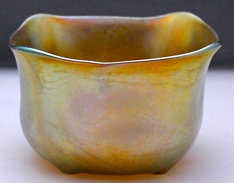 TIFFANY NASH SIGNED & NUMBERED FAVRILE BOWL: Stunning Free Form Tiffany Nash Favrile Bowl made between 1928-1931. Bottom is numbered 540 and signed Nash. Beautiful color and shape measuring 3 3/4"x3 3/4"x2 3/4",in excellent condition. Tiffany be