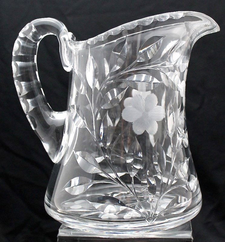 OUTSTANDING AMERICAN BRILLIANT CUT AND ETCHED PITCHER: Outstanding Exceptional Antique American Brilliant Period Pitcher. Very heavy at over 6 pds 4 ounces, dates to the first quarter of the 20th century. Deeply cut leaves and intaglio flowers cut by a ma