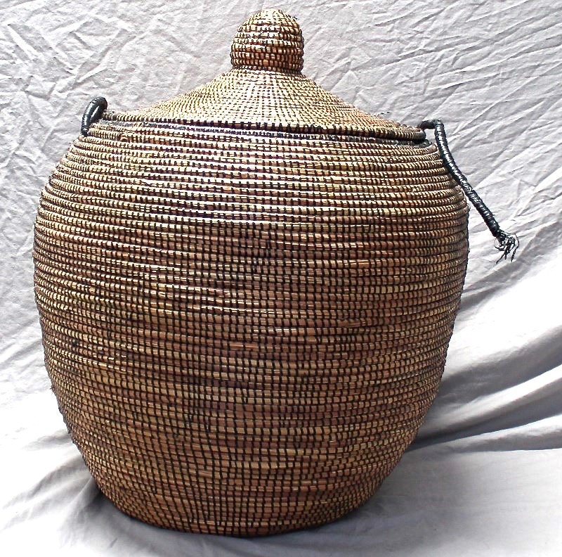 LARGE AFRICAN SENEGAL WOLOF PRAYER MAT BASKET: Vintage hand coiled African Prayer Hamper. Handmade in Senegal by woman of the Wolof Tribe, these hampers make an attractive, as well as functional, accent to any room. Large, this basket measures 22x