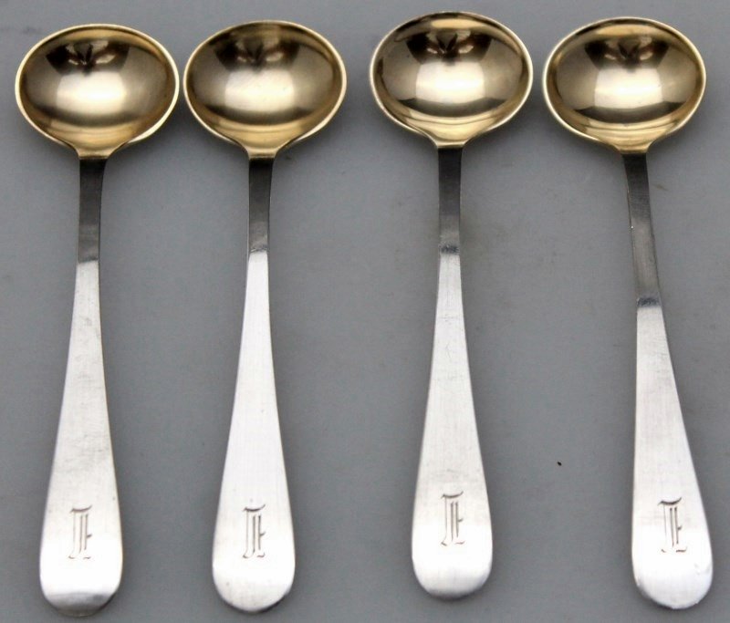 4 PC STERLING CHIPPENDALE 1885 DOMINICK & HAFF MASTER: 4 piece solid Sterling Silver Dominick & Haff Master Salt Spoons in the 1885 Pattern, Chippendale. Each one measures 4" long and all have gold wash bowls. Wt. 42 grams. Ornate initial monogram. Domini