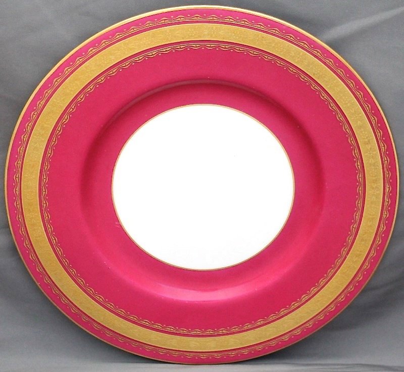 TWELVE MINTON c. 1912 SERVICE PLATES GOLD GILT: Stunning set of 12 Minton Service Plates that are gold gilt encrusted. These are hand decorated with heavy gold trim on white and deep rose porcelain. Retailed by J. McD. & S. Co. as denoted by the ma