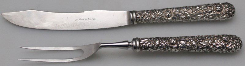 STERLING KIRK STEIFF REPOUSSE 1828 CARVING SET: Sterling Silver Kirk Steiff 2-Piece Steak Carving Set in Repousse 1828. Stainless Blade. The Kirk firm was founded in 1815 by the then 22 year old Samuel Kirk. He had a partner named John Smith until