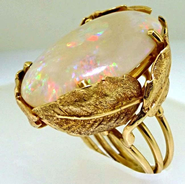ESTATE 21ct LARGE OPAL 14k RING: This one of a kind large opal ring is a statement piece for any discerning jewelry collector. The piece was made in Charleston, SC at Croghan’s Jewel Box on King Street in the early 1940’s and was