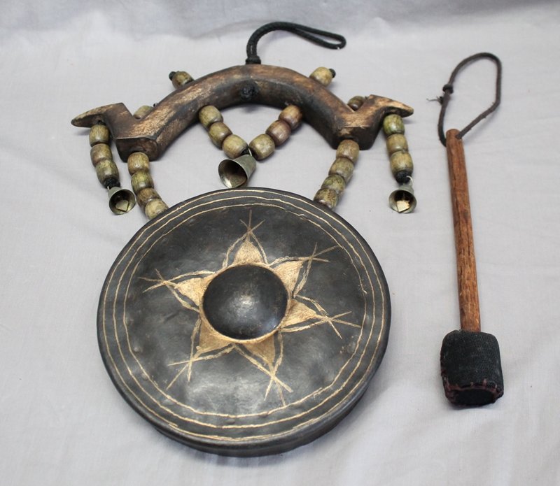 BUDDHIST BRONZE TEMPLE GONG: Vintage Buddhist Bronze Temple Gong / Bell with striker. The shape of the gong, and the traditional lotus design ground and polished through the rough textured finish, represents the Buddha's dharma (