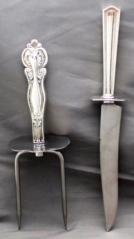 2 pc STERLING CARVING SET WHITING + INTERNATIONAL: 2 Pcs Sterling Silver Carving Utensils. A large F.M. Whiting Meat Fork for Roasts and a I.S. Co. (International Sterling) carving knife. Knife still quite sharp. No monograms. Knife Measures 11.5" and