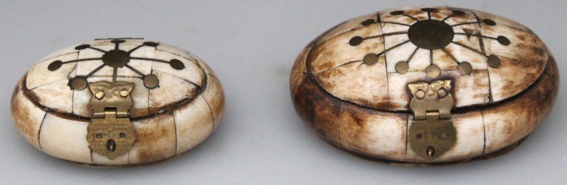 2 MIDDLE EASTERN CAMEL BONE TRINKET BOXES: 2 Middle Eastern Camel bone trinket boxes. With Brass inlay and hardware. Velvet interiors. PROVENANCE: A Hilton Head South Carolina Private Collection.Larger 4x2.75x1.75 smaller 3x2.25x1.25