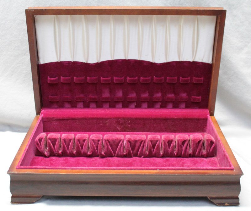SILVERWARE BOX: Great older mahogany silverware box with space for 12 place settings in the top and a drawer for serving pieces. The inside of the box has a red velvet and white satin lining with only very light wear