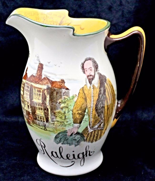 ROYAL DOULTON RALEIGH PITCHER: A handsome English antique gourd style porcelain pitcher by Royal Doulton, completed in a retro Queen Elizabeth transfer & hand painted enamel finish. Our pitcher is noted as a "Raleigh" pitcher, with
