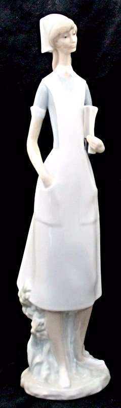LLADRO NURSE: Lladro Female Nurse. In Spanish she is called Efermera. Issued in 1969 and retired in 1978. Done by Lladro sculptor Salvadore Furio. PROVENANCE: A Pennsylvania and Kiawah Island Private Collection. Me