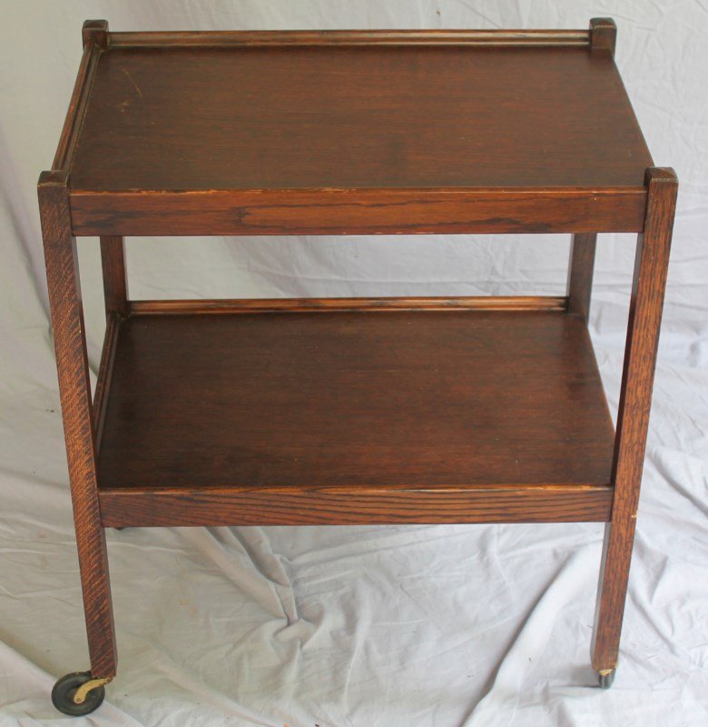VINTAGE ENGLISH OAK TEA CART: Vintage English Oak Tea Cart. Perfect to serve cocktails or tea. Circa 1950. 15 3/4x24x27. 10pds