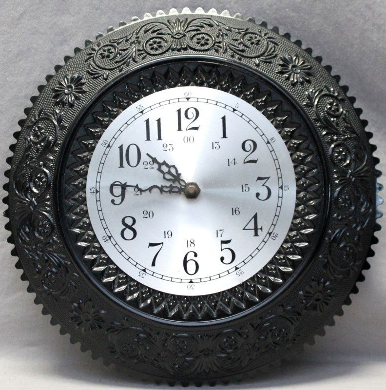 TIARA BLACK INDIANA GLASS WALL CLOCK: Black Tiara Indiana Glass wall clock. Needs battery. Tiara glass was manufactured by a number of companies, including Indiana Glass Company, Fenton Art Glass, L.E. Smith and Duncan & Miller. The glass