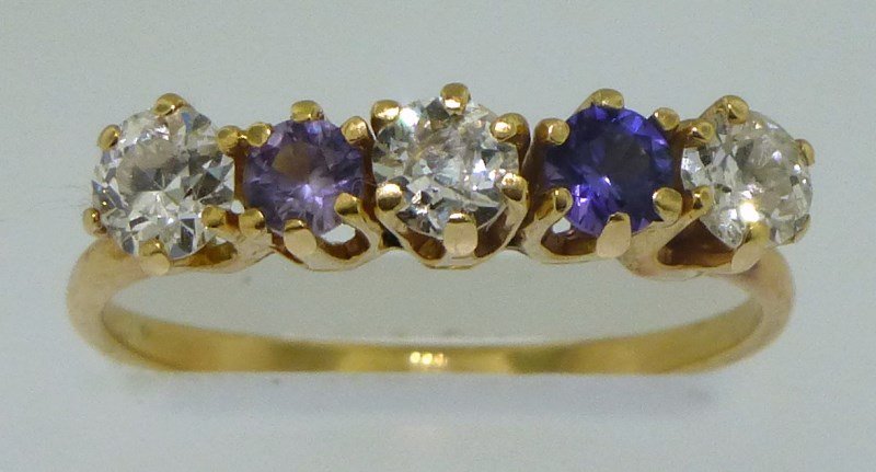 GWTW ESTATE 14K EDWARDIAN DIAMOND AMETHYST RING: From the Estate of Mary Alicia Rhett (India Wilkes in Gone with the Wind) comes this antique Edwardian 14k yellow gold Ladies 5 stone ring. The ring is a size 6, prong set with two old mine cut and on
