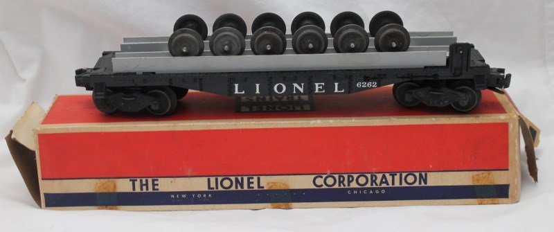 LIONEL TRAINS WHEEL FLAT CAR No. 6262: Lionel Trains Wheel Flat Car 6262 and original Box. The 6262 Wheel Car was introduced in 1956 and only manufactured for two years. It's based upon a real-life flatcar used by many railroads in their r