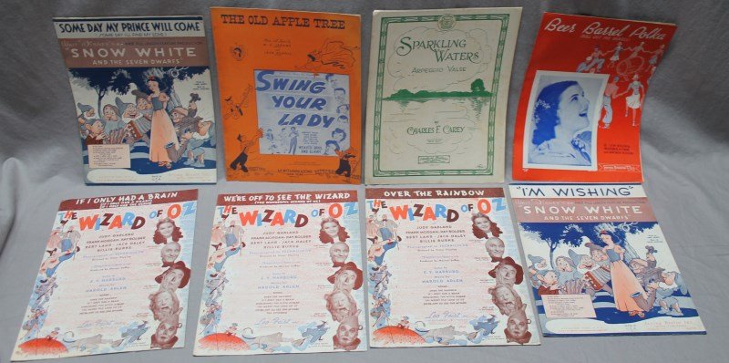 8 1930-40 SHEET MUSIC SNOW WHITE - WIZARD OF OZ: Group of 8 Vintage 1930 and 1940 Sheet Music. There are 3 Original Sheet Music from The Wizard of Oz, We're off to see the wizard, If I only had a brain and Over the rainbow. All were published by Leo