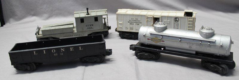4 PC LIONEL TRAINS 1940-50s CABOOSE-SUNOCO-MILK-GONDOLA: 4 Piece Lionel Train Lot. To include: The D.L. & W. Work Caboose No. 6419 which replaced the No. 2420 in 1948 and would be available until 1950. It was again produced from 1952 until 1955. Lionel remo