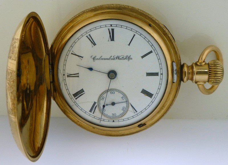 COLUMBUS WATCH CO. 1892 POCKET WATCH: Columbus Watch Company Pocket Watch c. 1892. Full plate, 18 sz, double sunk porcelain face, etched hunter case, running. Serial #318518, Fahys 14k Monarch Case (This is heavy Gold Plate). PROVENANCE: 