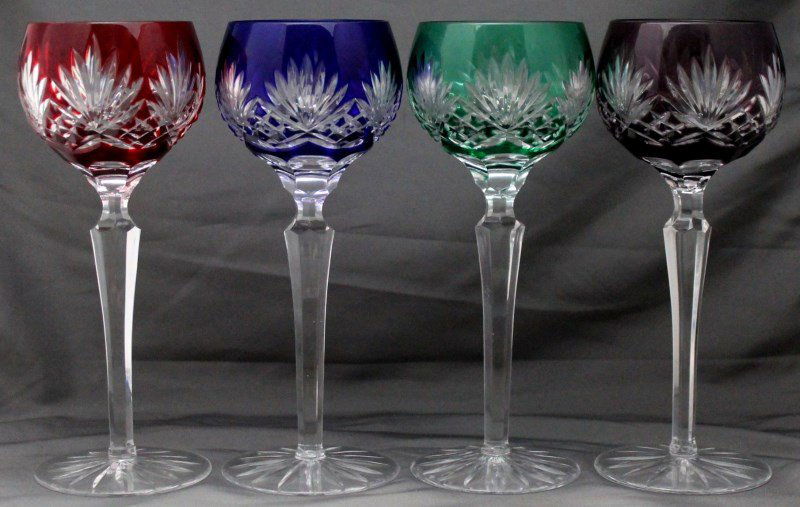 SET OF 4 BOHEMIAN CUT CRYSTAL HOCK WINE GLASSES: Set of 4 Vintage Matching Bohemian Cut to Clear Crystal Hock Wine Glasses. Excecuted in multiple colors of Ruby, Green, Cobalt and Amethyst. Each measures 8 1/4 tall. PROVENANCE: A private collection