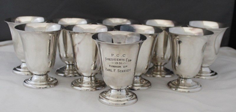 10 1931 PRESIDENTS CUP MULHOLLAND CORDIALS: Set of 10 matching Vintage 1931 EPNS Cordials manufactured by Mulholland of Aurora Illinois. This firm ceased business in 1932. One is inscribed P.C.C. Presidents Cup 1931 Runner Up Karl F. Scheidt. A