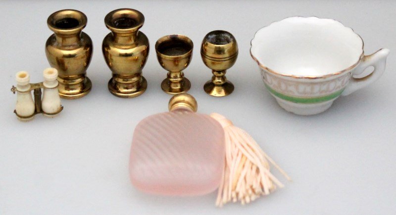7 pc MINIATURES - BINOCULARS - BRASS POTS - PERFUMES -: A grouping of 7 Vintage/ Antique Miniatures. 1- bone binoculars1".2- 2 solid brass vases 1.25. 3- 2 solid brass goblets 4- Pink swirl glass perfume tassel 2 1/2 long. 5- MIJ teacup 1 tall. Wt. 6 oz. P