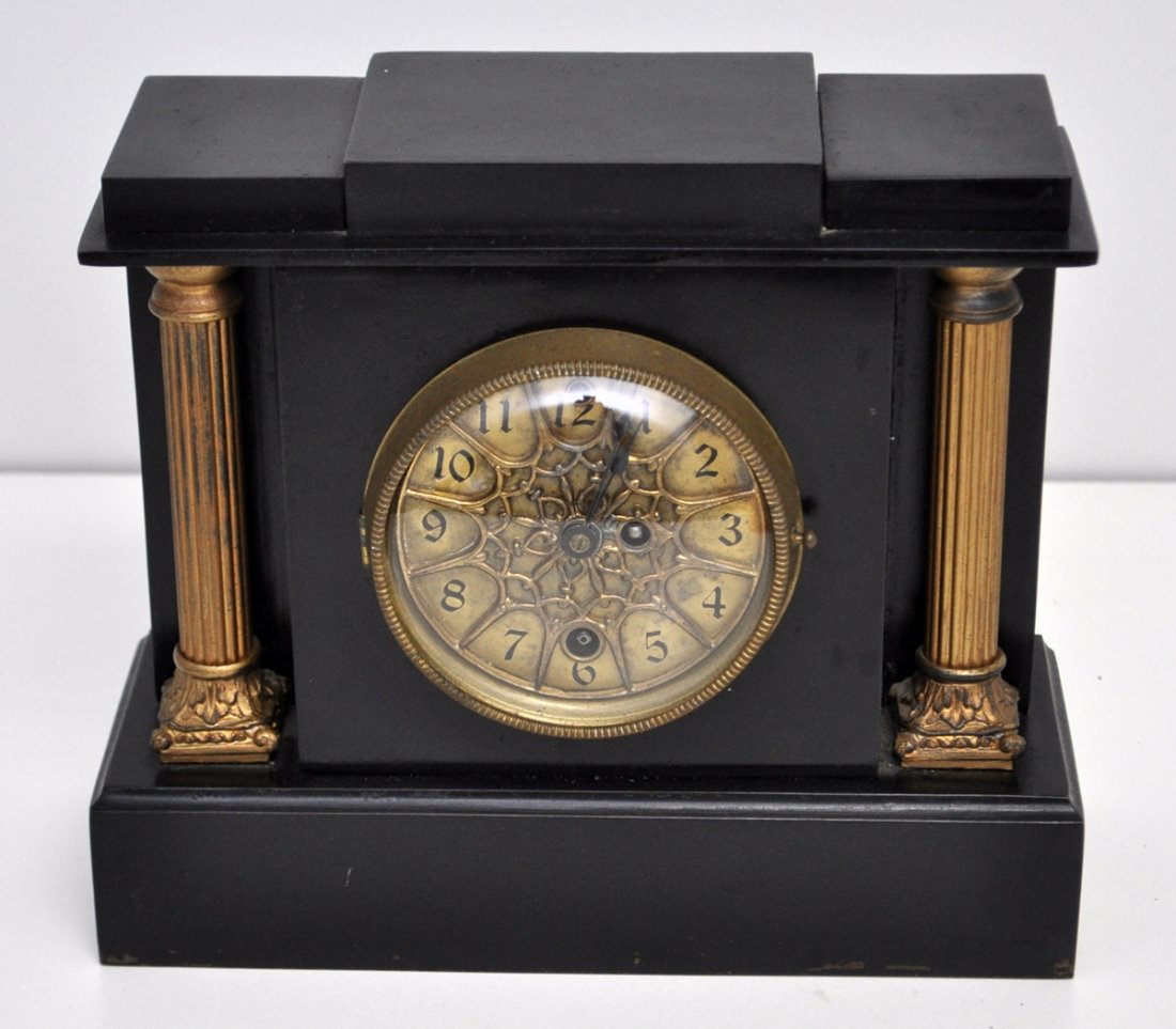 BRASS FACE CAST IRON MANTLE CLOCK (1 of 9)