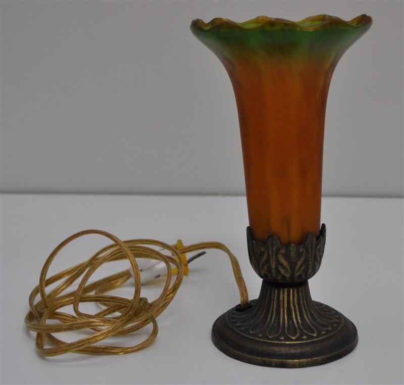 VINTAGE ART GLASS BOUDOIR LAMP: Vintage Art Glass Boudoir Lamp with Metal Base. Measures 4.50x4.50x8. Satin Glass Blown Shade in greens and ambers.Small nick to base of shade, not visible. Wt 1 pd 3 oz. PROVENANCE A Historic Charlot