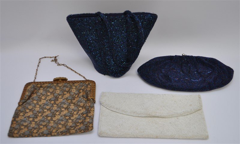 4 VINTAGE PURSES BEADED & BROCADE: 1. Vintage 1920s Brocade Daisy & Lily Purse with ornate JEMCO Filigree frame and clasp. Satin lined. Measured with out handle 8x6.50. 2 Royal blue glass beaded Purse lined in Navy. 8.50x6.50 3. Vintag