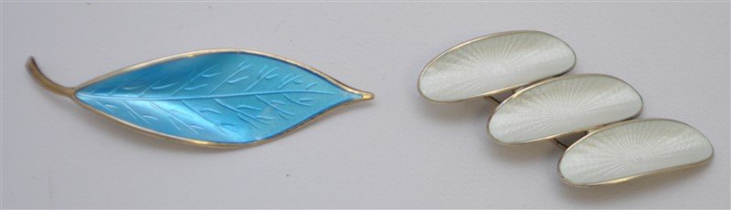 2 DAVID ANDERSON STERLING MID CENTURY BROOCHES: 1 - Mid century sterling silver and blue enamel Norwegian leaf brooch. This brooch is from the David Anderson Co, and was designed in 1950's by Willy Winnaess. It is in excellent condition and measure