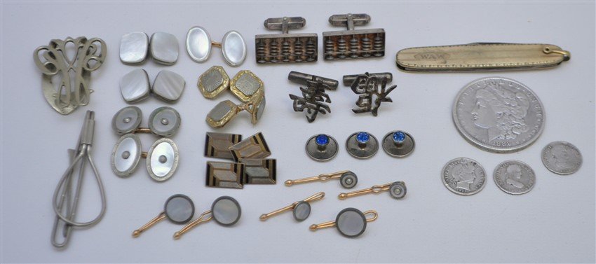 21 pc 1888 SILVER DOLLAR - KREMENTZ STUDS - FRENCH: 1- 4 Pair French Cufflinks including MOP. 2- 6 Antique Krementz MOP shirt Studs. 3- 3 Blue Rhineston Shirt Studs. 4- 2 Pair Sterling Abacus Cufflinks and Chinese Silver Calligraphy. 5- German Silver M