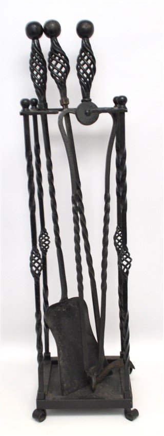 ANTIQUE WROUGHT IRON FIRPLACE TOOLS: American Antique Black-Painted Wrought-Iron and Coil-Twist Fireplace Tools with Stand. Old Black Paint. Tools all approx 30" Stand is 7.50"x7.50"x25" tall. Weight on all is 19 pds. PROVENANCE: A Charl