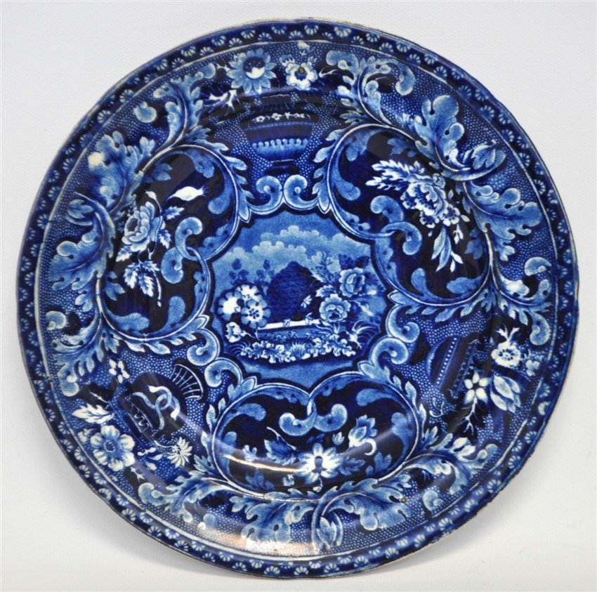 STAFFORDSHIRE C. 1809 BEEHIVE PLATE: A Rare Antique rich deep blue and white Staffordshire plate by Ralph Stevenson, circa 1809. Features a large beehive in the center with florals and scrolls all around. No maker's mark, but pattern is 