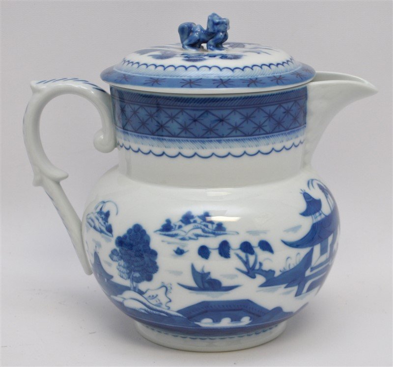 MOTTAHEDEH BLUE CANTON PITCHER AND LID: Mottahedeh Blue Canton Pitcher with a Foo Dog Lid from a Mottahedeh Lid. PROVENANCE: The Private Estate of a Atlanta, Georgia Antiques Dealer. The most fashionable tables in the early American Republi