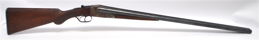 C. 1900 ITHACA DOUBLE BARRELED SHOTGUN: We are pleased to present this ca 1900 Ithaca Hammerless steel side by side, double barreled shotgun. This classic shotgun was offered in all of the major bores, .12 - .410, and was in the first third