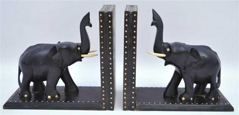 2PC VINTAGE ELEPHANT BOOKENDS: 2 Vintage Ebony Wood Elephant Bookends with bone accents. 7.50x4.25x6.75" Weight combined on both 4 pds 6 oz. PROVENANCE: A Washington DC / Charleston SC Private Estate.