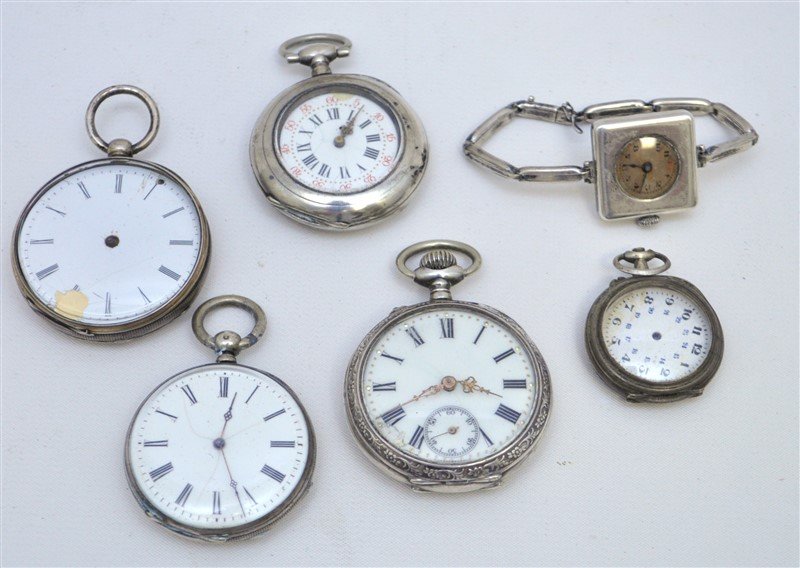 6 ANTIQUE POCKET WATCHES: 5 Antique Pocket Watches & 1 Art Deco Ladies Wristwatch, repair or parts. The smallest pocket watch is just a case and face, no works. A great lot for winter restoration projects or for the pocket wat