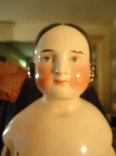 23" Early China Head Doll: Early pink tinted China head, right shoulder has been professionally restored, body, arms and legs are all original. Purchased from Richard Wright.