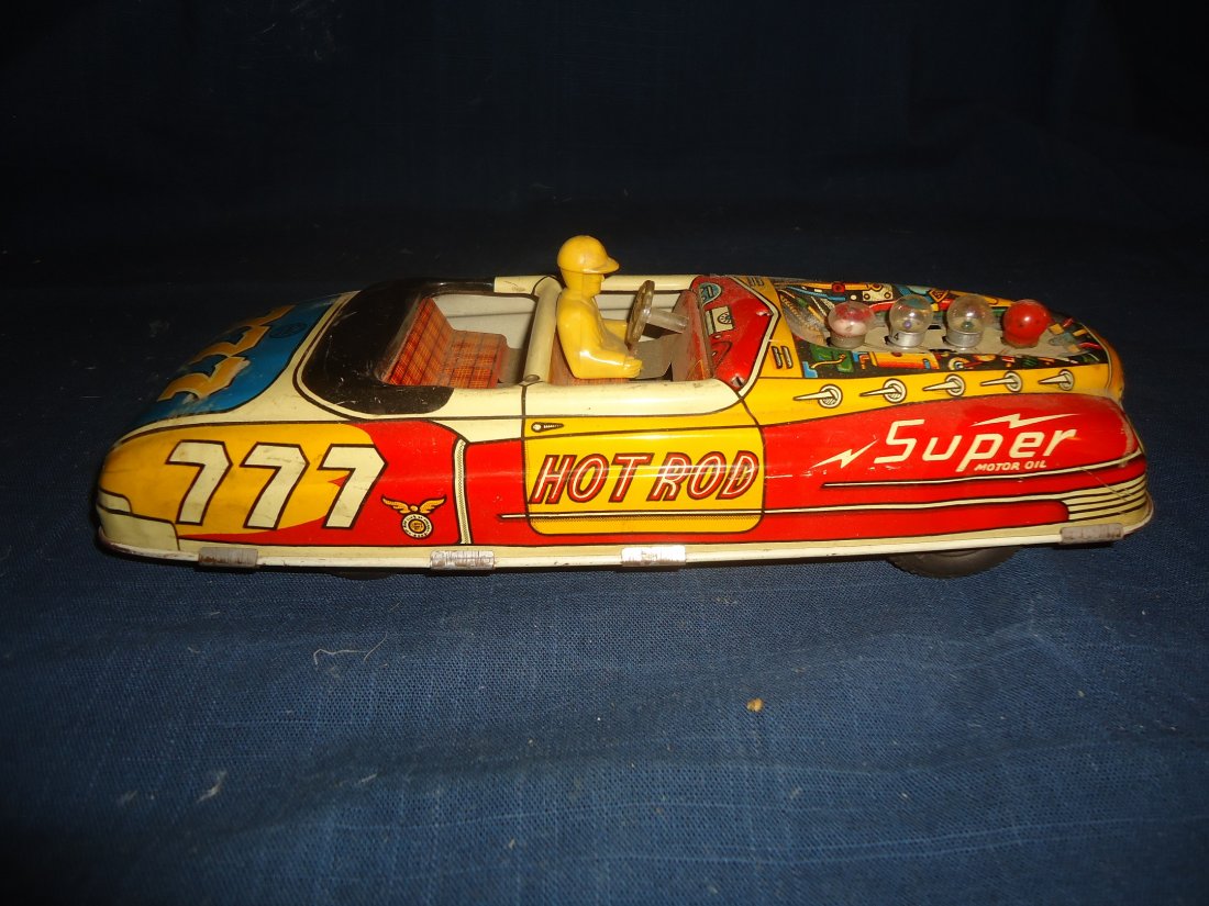 Marx Hot Rod- Battery Operated: Missing wind shield, lithography near mint, 11" long