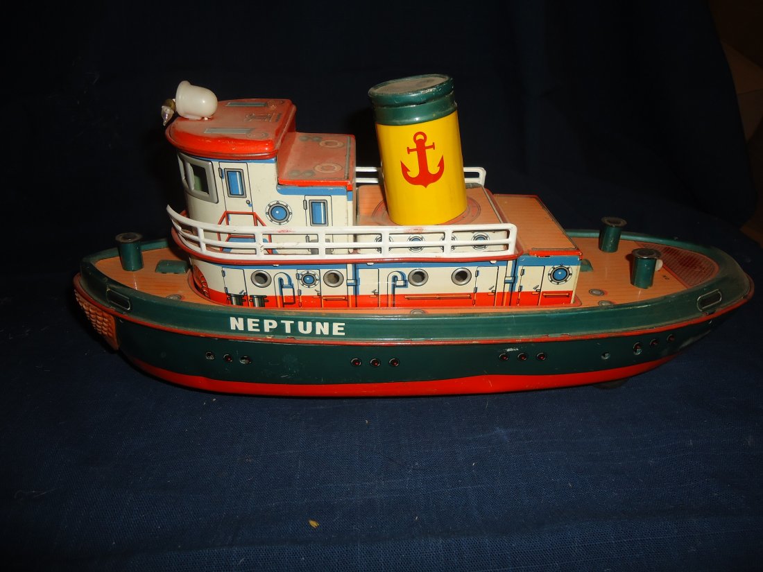 Neptune Tug Boat- Battery Operated: tin lithographed tug boat, near mint, 14 1/2' in length, Modern Toys- Made in Japan