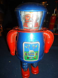 Vintage Robot: Great surface, 8 1/2" tall, made in Japan.