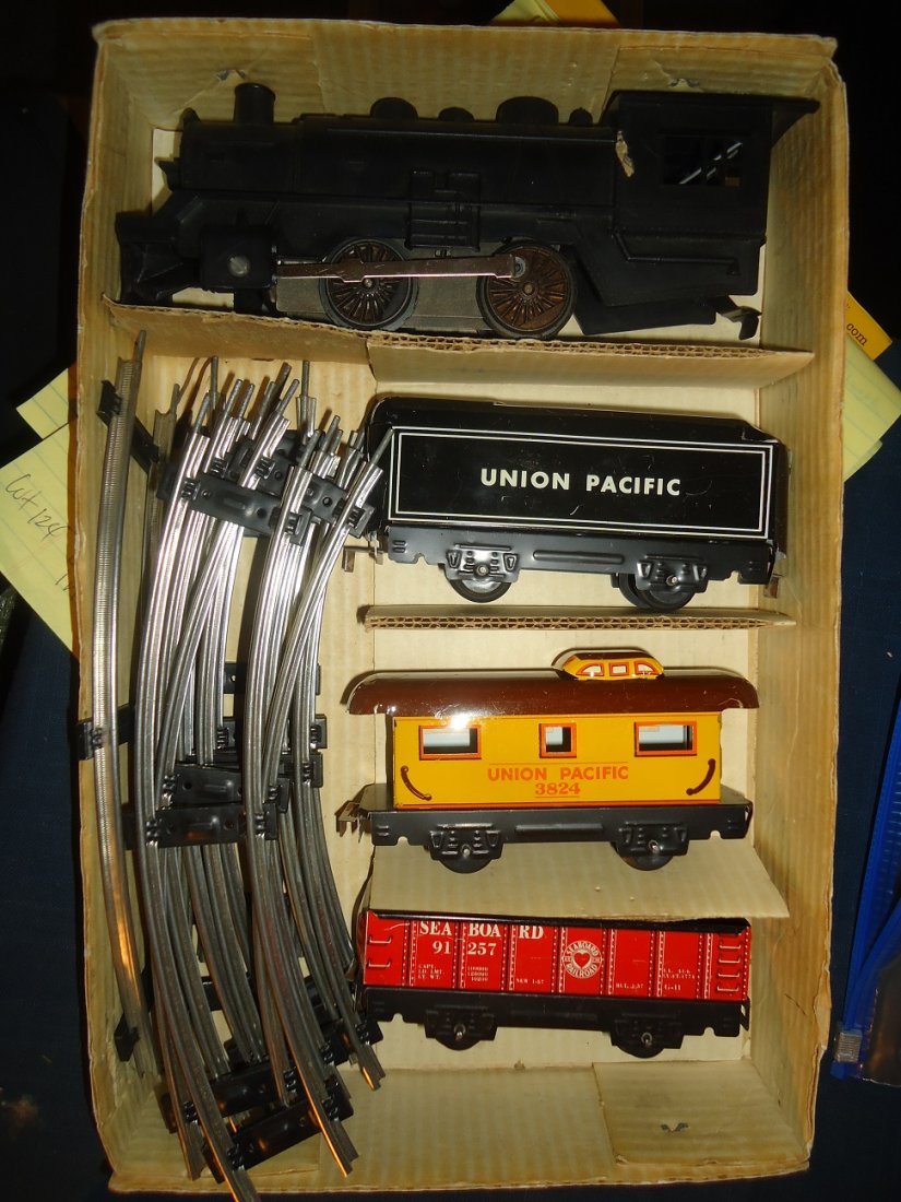 Vintage Marx Train Set- Battery Operated MIB: Mint set in the box, with track. Box has taped corners otherwise near mint. Box measures 15 1/4" x 10"