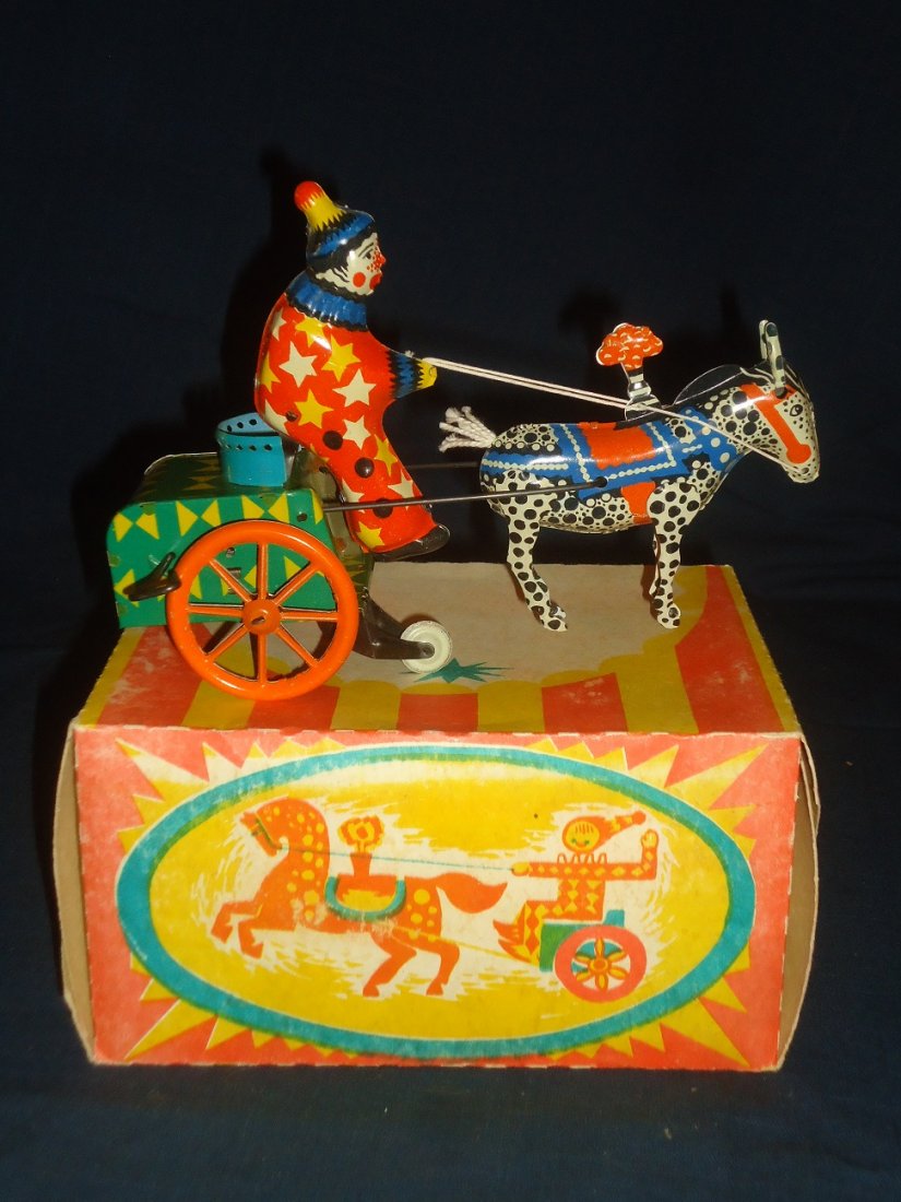Russian Lithographed Wind-Up Toy: 7" long, unique toy, mint in box, working order.