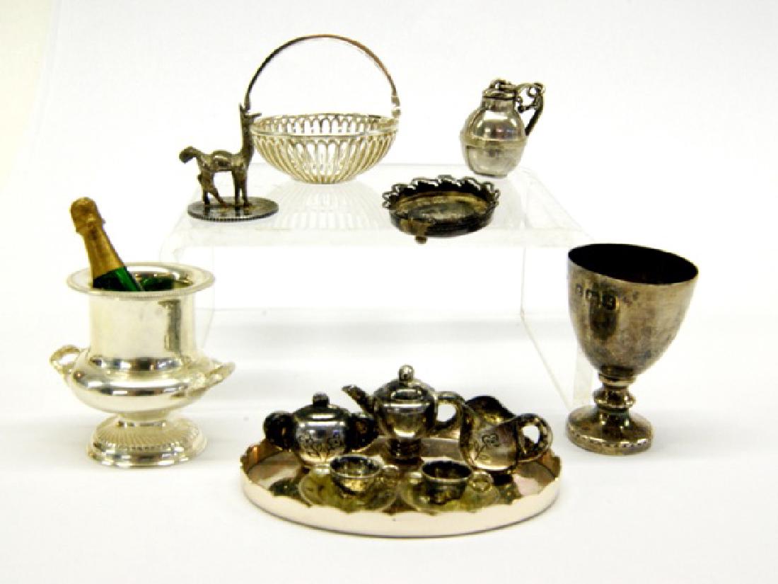 English Sterling Table Items & Others: George IV style wine cooler 1"H with bottle by J.T.T. London, Georgian style swing arm bread basket 1.1"W by J.T.T. London, goblet 1.2"H by R.P. Birmingham also three footed salver made from 1867 Fren