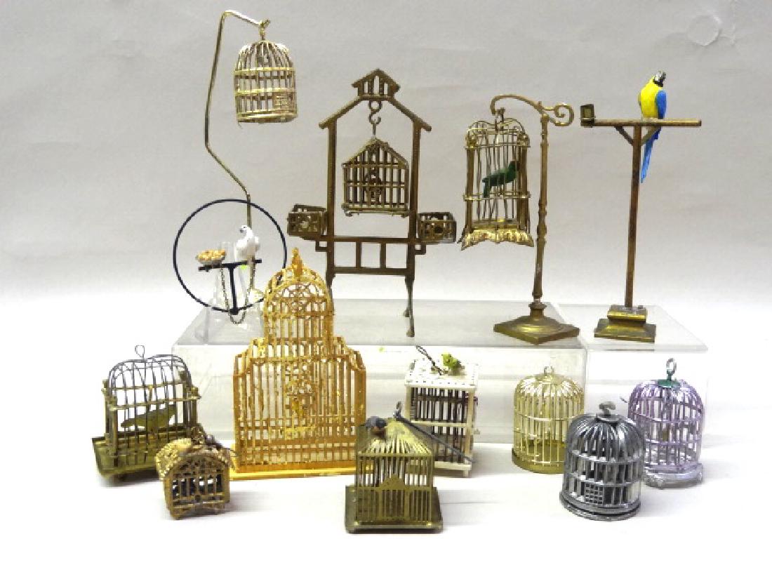 Dollhouse Miniature Birdhouse Collection: Two vintage ormolu birdhouse with wax birds, bone birdcage, assorted brass, lead and tin birdcages, two birds on stands, tallest 4.5"