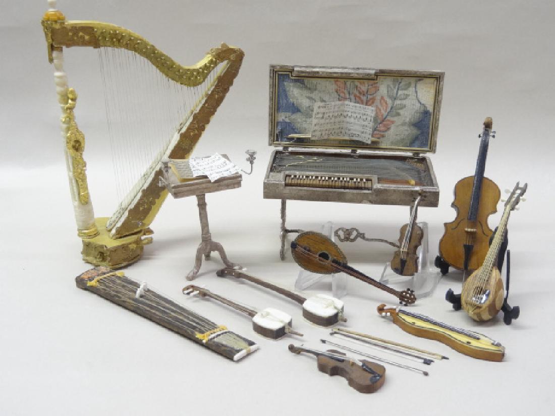 Dollhouse Miniature Musical Instruments: Wood harp trimmed with bone 6.5"H painted by Renee Wilson, vintage wood melodeon with soft metal legs 4.25"H painted by Renee Wilson, wood Chippendale style music stand with two candlesticks painted b