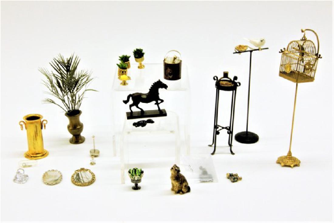 Large Group of Metal Dollhouse Miniatures: Brass umbrella stand 1.5"H, brass wine cooler, animals, parrot on stand, birdcage on stand 5.5"H, brass planter with fern, stand with lead ashtray, binoculars, two mirrors, etc.