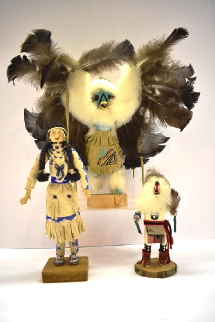 Three Native American Kachina Dolls, One Suede: large Kachina Eagle by Connie Edsitty 425870 13 in H., FEATHER SPAN 13 in. with some small loose feathers, Kachina WHITE BEAR by Tehll 6 1/2 in., one fully dressed squaw in suede & Indian beads 10 in.