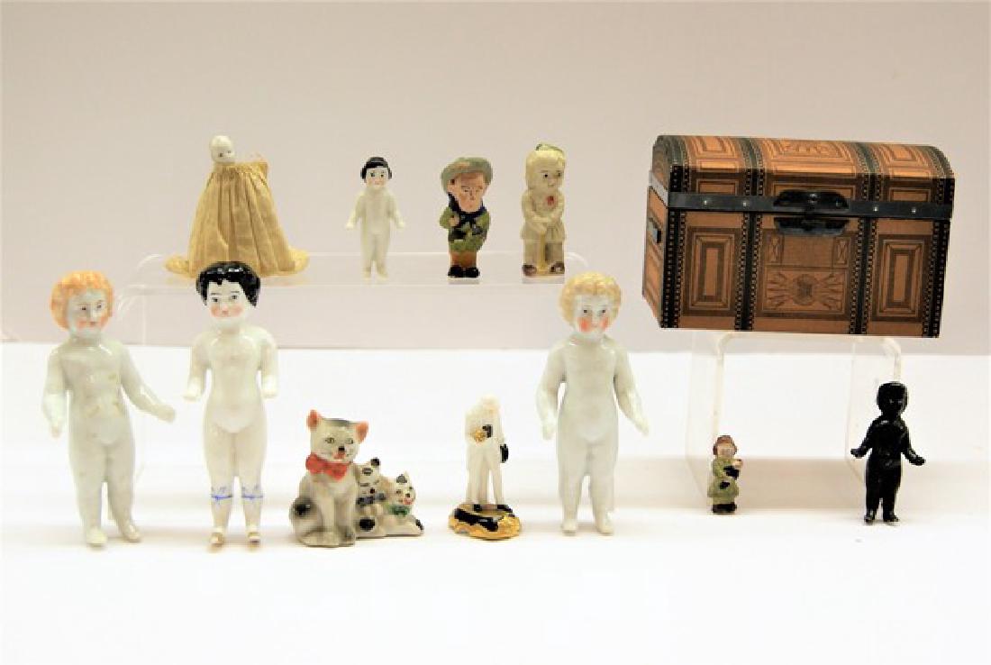 Group of Frozen Charlottes & Trunk (1 of 3)