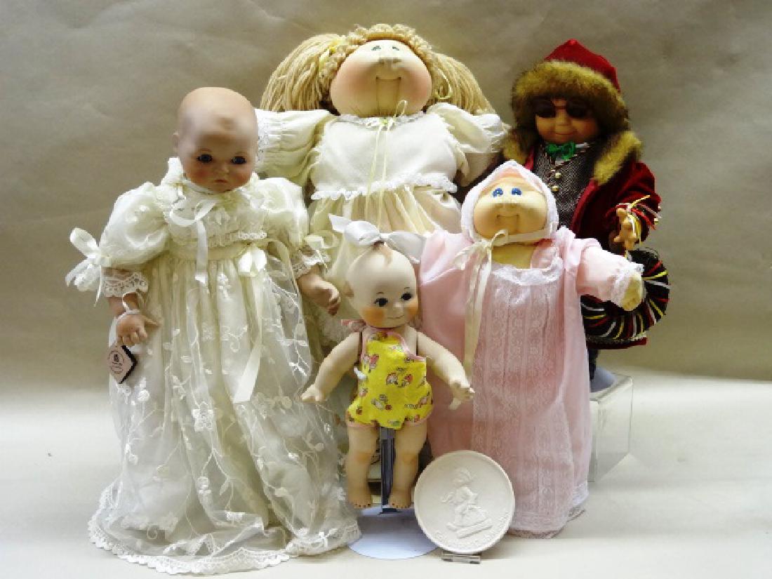 Group of Dolls, Kewpie, Cabbage Patch etc.: Effanbee Kewpie and Artist Kewpie, Two Cabbage Patch dolls one signed, Marie Osmond baby 15"